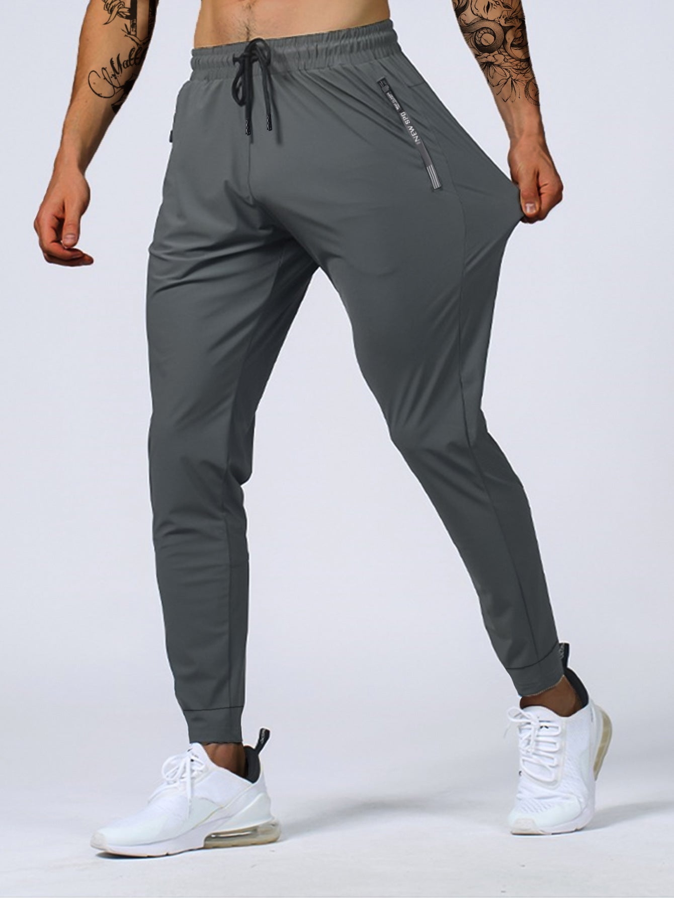 Joggers | Ademend stretchmateriaal met ritssluiting 0