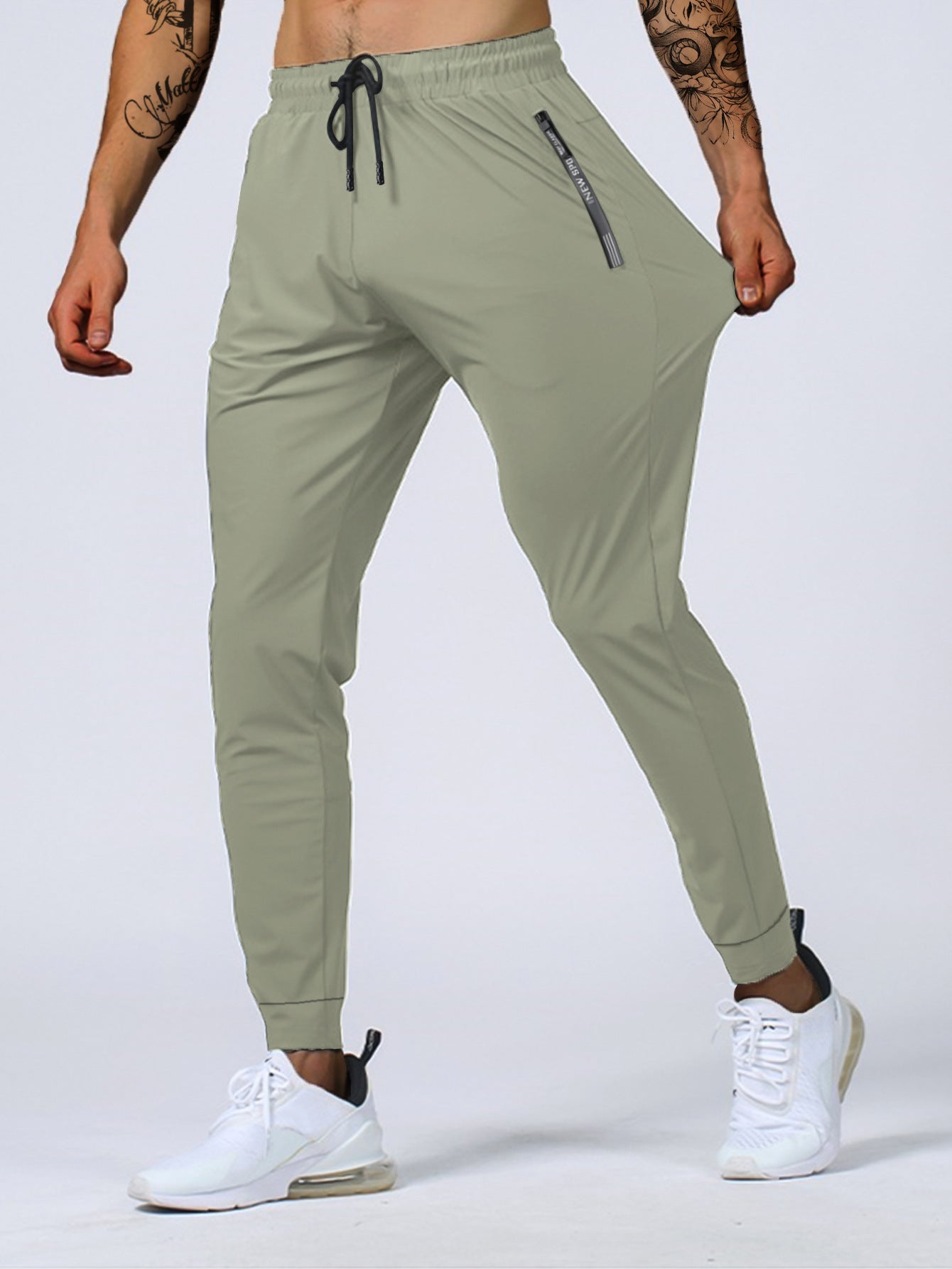 Joggers | Ademend stretchmateriaal met ritssluiting 1