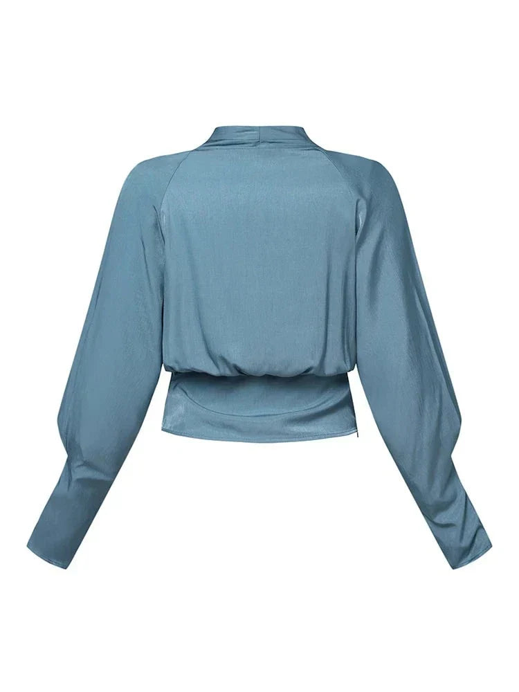 Blouse met V-hals en pofmouwen – Romantische top met taille-ac-centrering voor dames