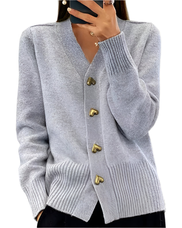 V-hals vest met comfortabele gebreide stof en charmante hartvormige knopen