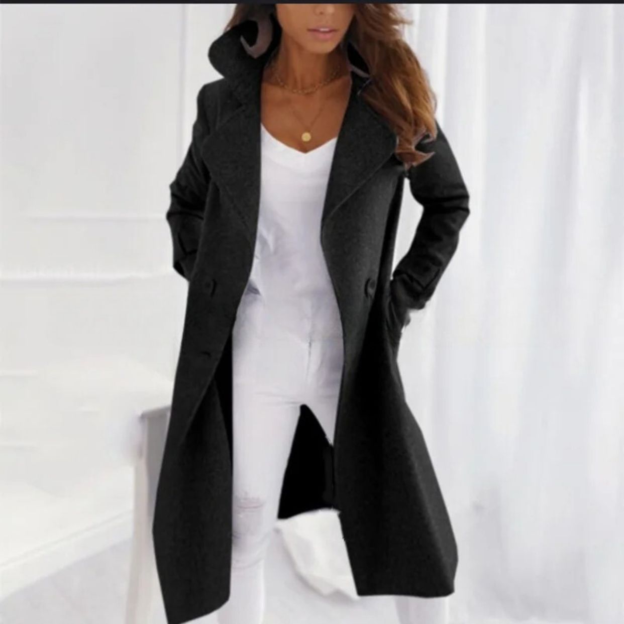 Comfortabele en stijlvolle lange trenchcoat met omgeslagen kraag voor dames